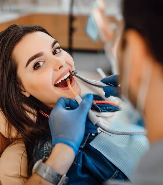 young-female-patient-visiting-dentist-office_496169-930